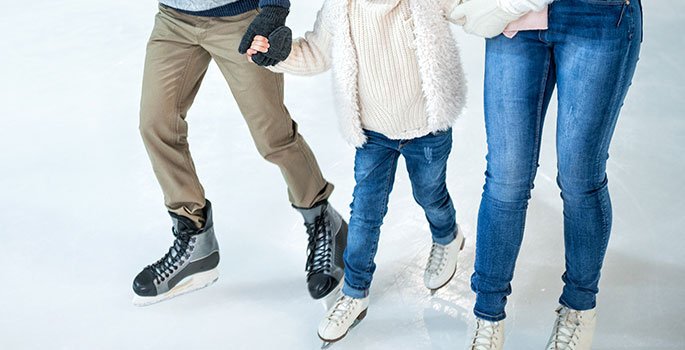 Family skating indoors